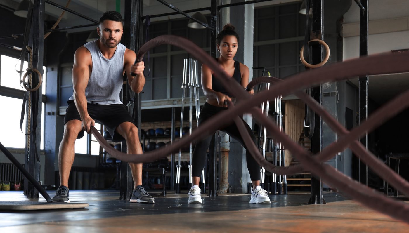 Functional training — battle ropes, two athletes
